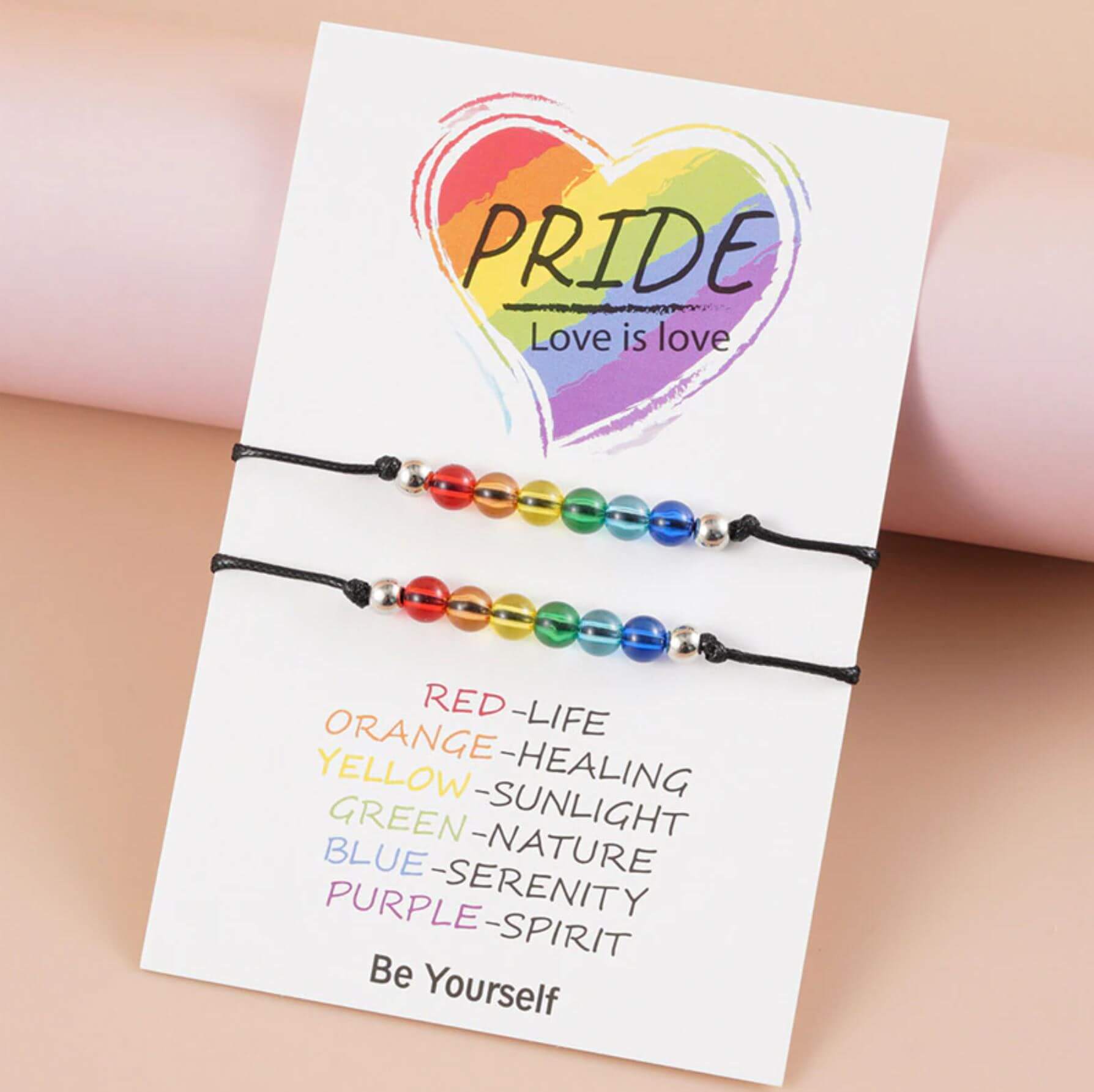 Two matching rainbow friendship bracelets for best friends to share pride